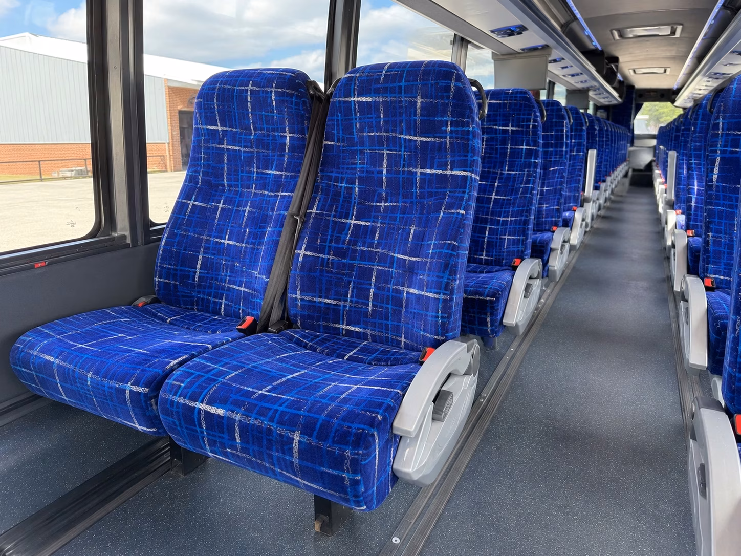 bus type affects charter bus rental prices in lowell massachusetts